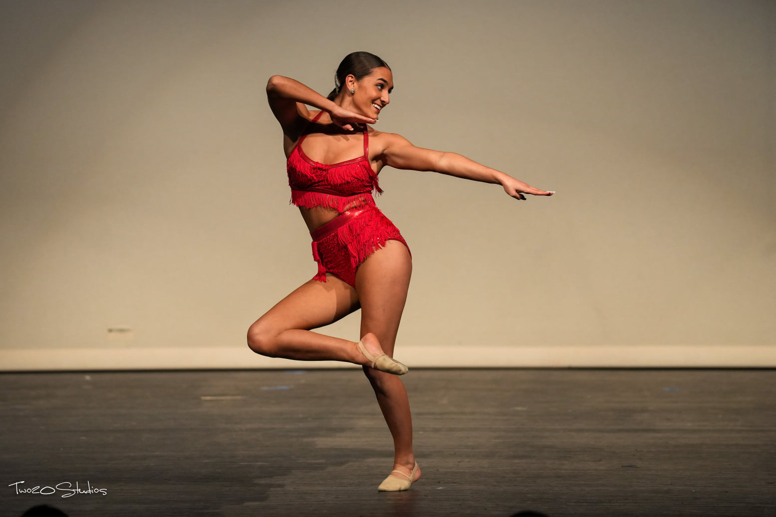 Emotional Female Ballet Dancer in Body Suit and Posing in Dance in
